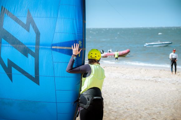 Kitesurfing beginners on the beach
