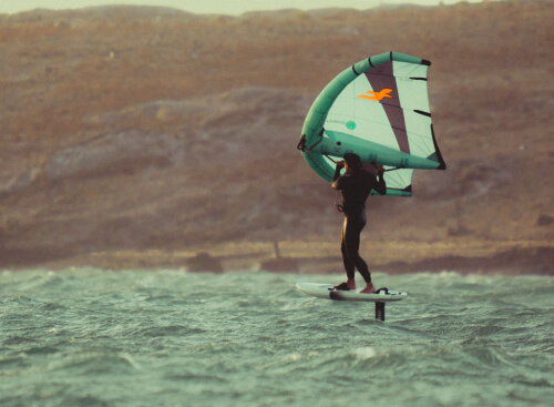 Kitesurfing beginners on the beach