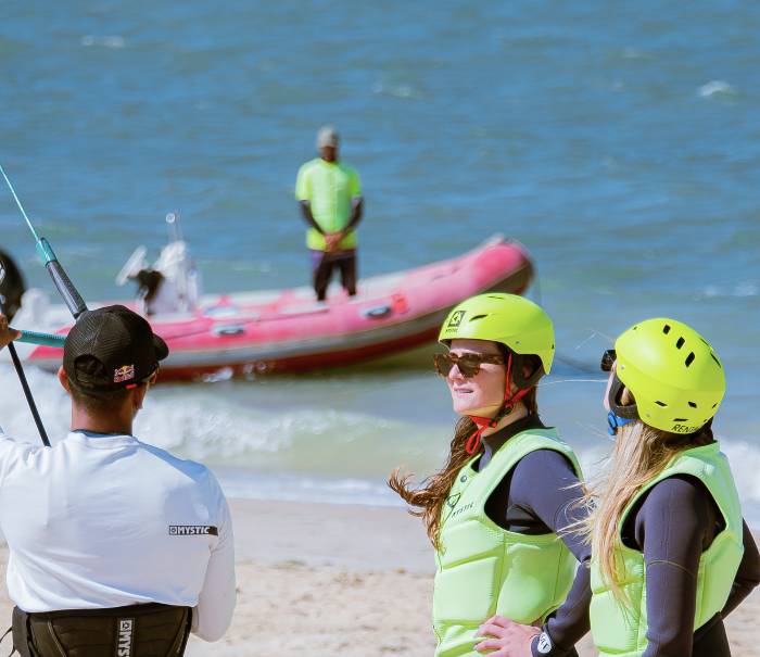 Kitesurfing beginners on the beach